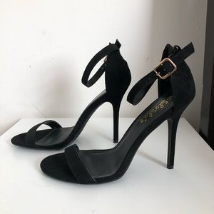 Black single strap heels